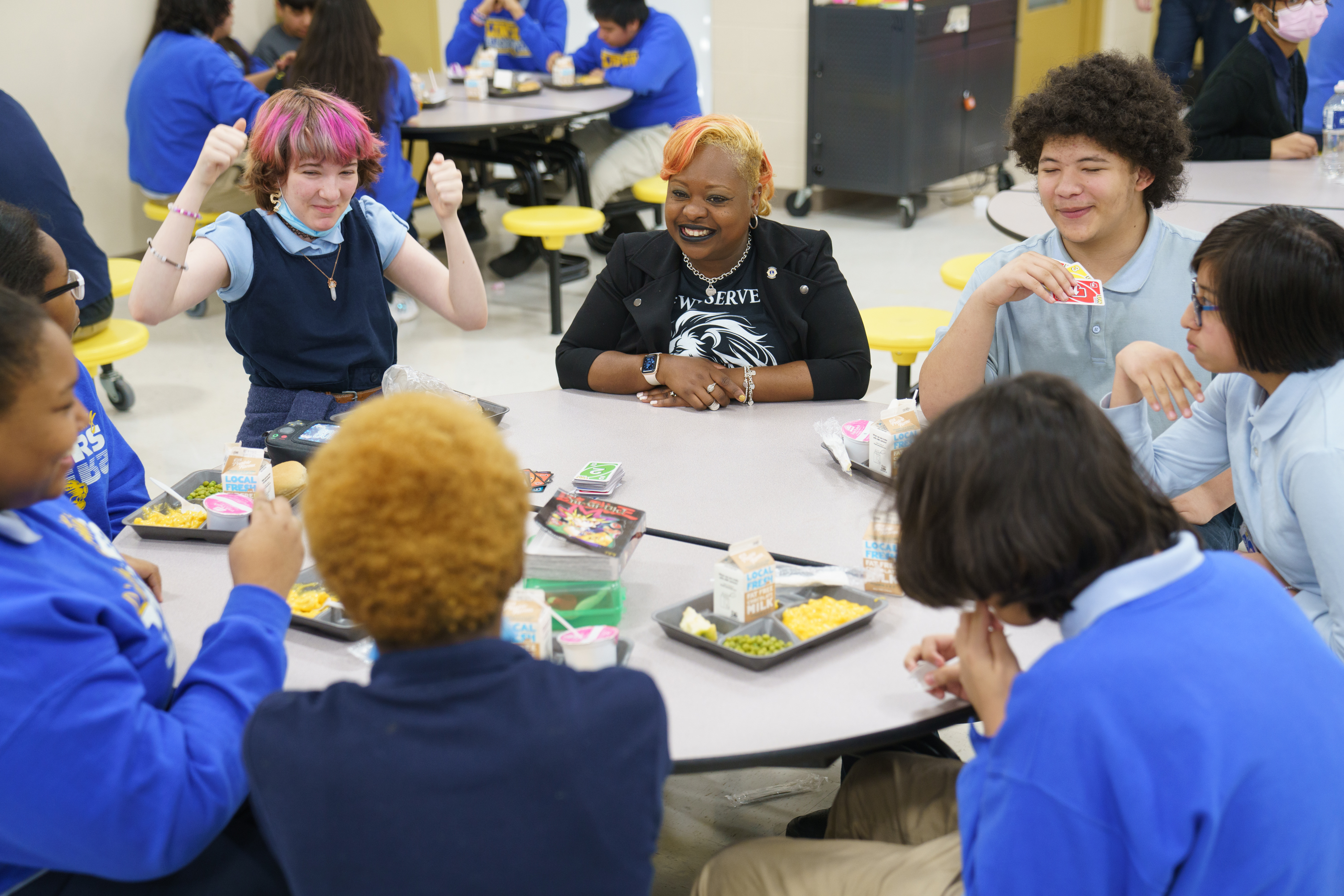 Photo of students engaging with each other in conversation