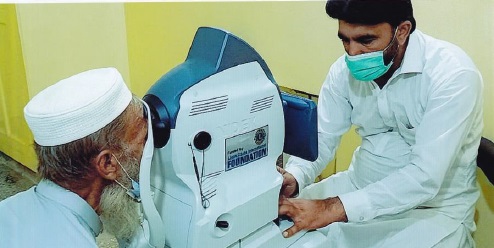 Doctors giving eye exams at Khyber Eye Foundation