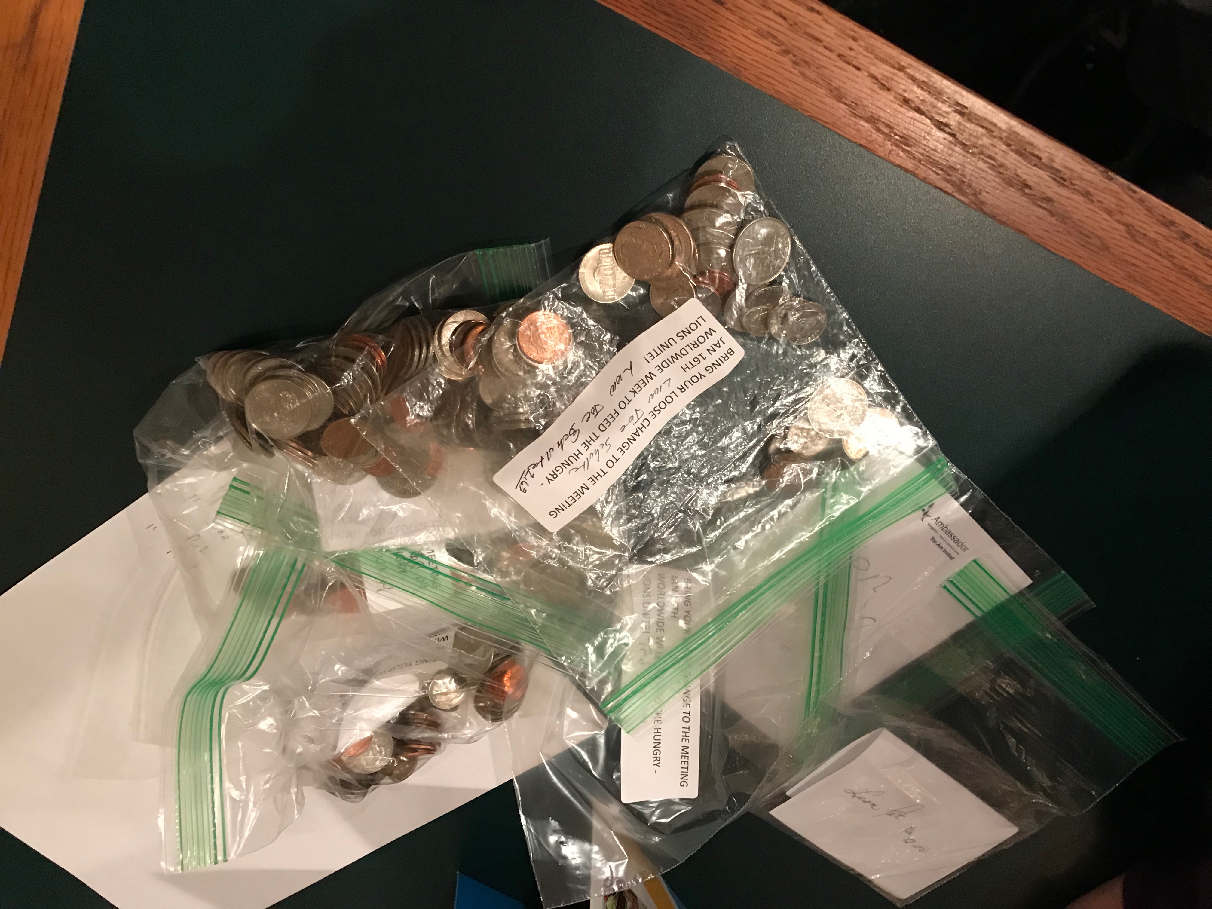 Here are several of the bags of coins the Lions collected for their "Time for Change" program.